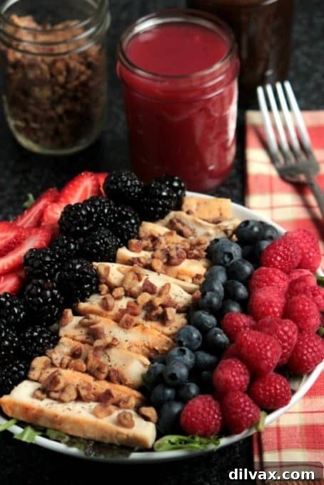 Grilled Chicken Berry Salad, a healthy, flavorful, and colorful dish for summer meals.