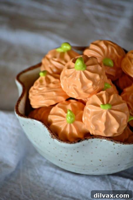 A festive platter of Pumpkin Spice Meringue Pumpkins, perfect for fall gatherings
