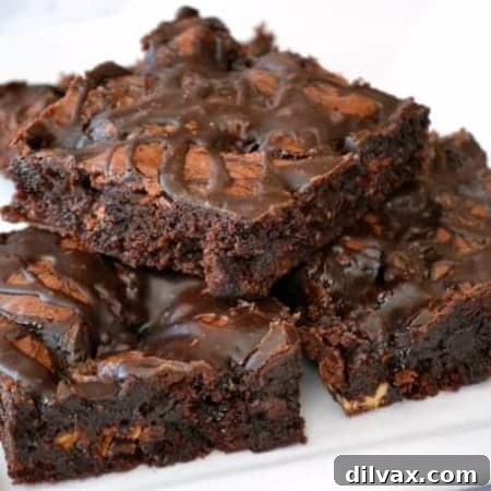 A top-down view of the irresistible Chocolate Overload Loaded Brownies, perfect for satisfying any chocolate craving.