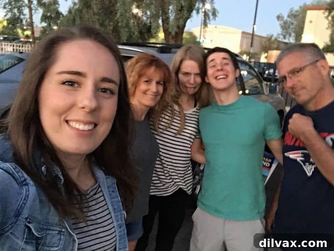 Family taking a fun selfie outside the restaurant