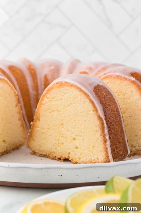 The perfect 7UP Pound Cake with a golden crust, tender crumb, and lemon-lime glaze.