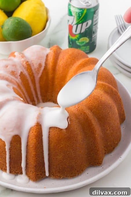 A glistening 7UP Pound Cake, freshly glazed and ready to serve.
