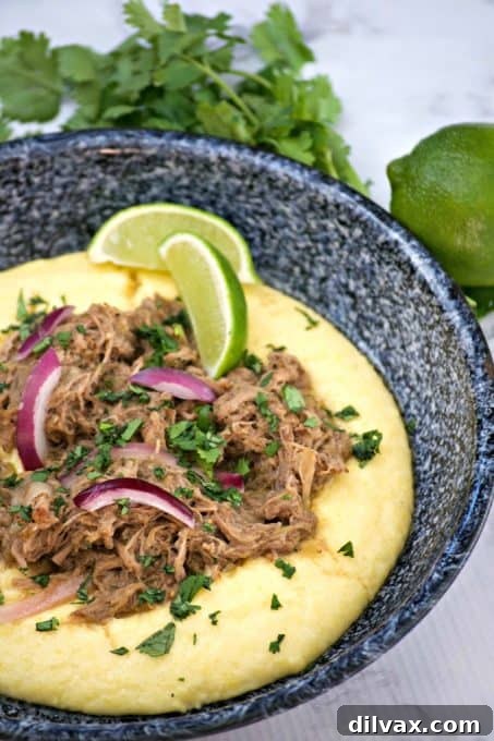 Slow Cooker Beef Chili Verde with Polenta are savory beef short ribs with salsa verde. Serve with polenta and you've got a super easy and delicious dinner.