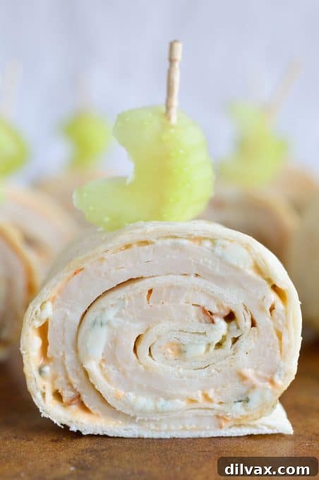 Touchdown Treats 29 Spicy buffalo chicken tortilla roll-ups, a convenient and delicious way to enjoy buffalo chicken flavors.