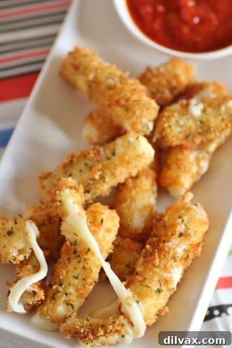 Touchdown Treats 32 Classic gooey mozzarella cheese sticks, a perennial favorite for dipping.
