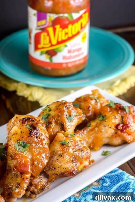 Touchdown Treats 4 Sweet and spicy mango habanero wings, a perfect flavorful twist for your game day appetizer table.