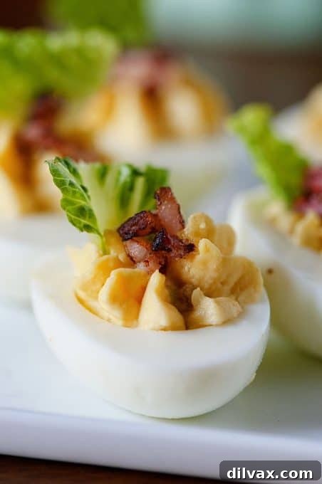 Touchdown Treats 41 Innovative bacon Caesar salad deviled eggs, a flavorful twist on a classic appetizer.