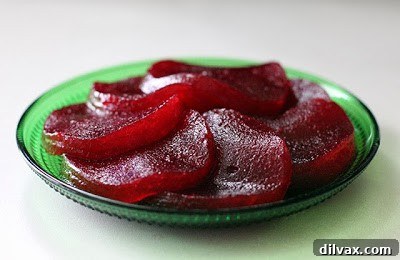 Classic cylindrical jellied cranberry sauce, potentially with ridges.