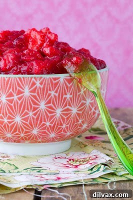 Spicy apple and cranberry compote, with visible spices.
