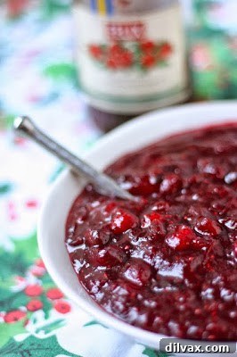 Lingonberry jam cranberry sauce, vibrant and smooth.