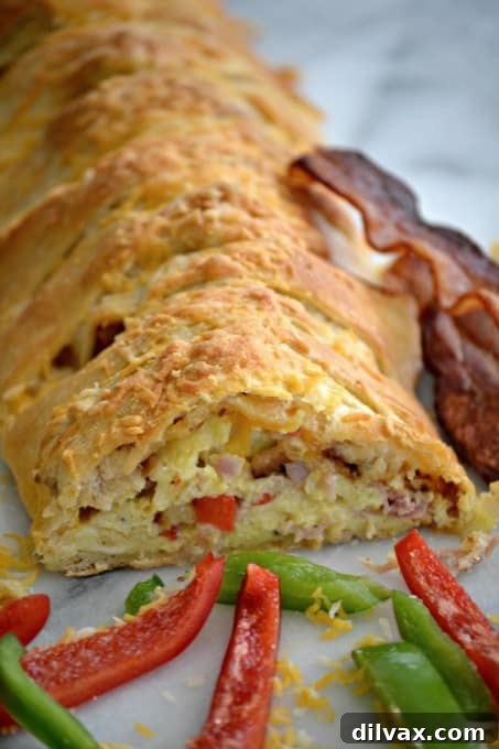 Braided Spaghetti and Meatball Bake 7 A hearty Denver Scrambled Breakfast Braid, packed with fluffy eggs, savory ham, crisp bell peppers, and onions, all encased in a golden pastry, perfect for brunch or breakfast.