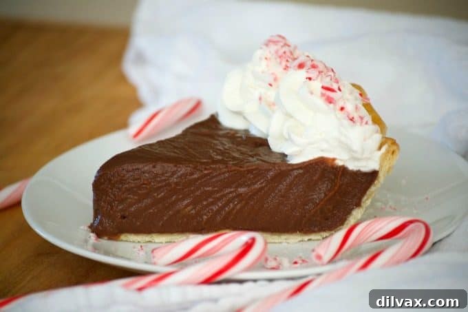 Silken Chocolate Peppermint Cloud Pie 2 Delicious Chocolate Peppermint Cream Pie with a smooth, creamy chocolate filling and a hint of McCormick Pure Peppermint Extract, perfect for holiday gatherings.