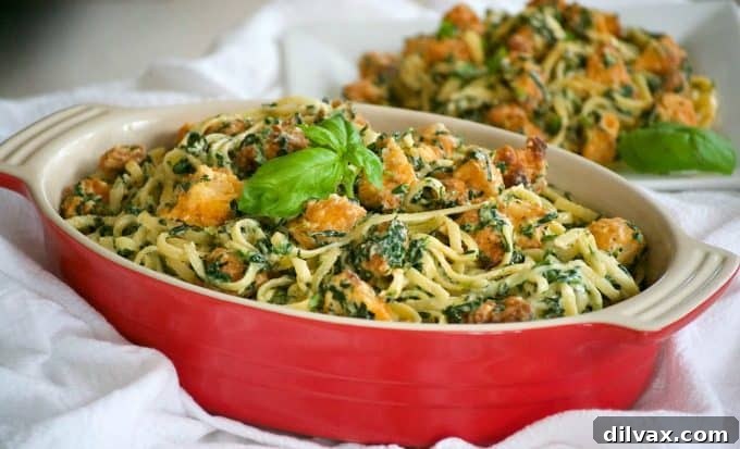 Delicious Buffalo Chicken Spinach Alfredo pasta dish, featuring tender pasta, creamy Alfredo sauce, zesty buffalo chicken bites, and fresh spinach. A perfect quick and easy weeknight dinner for the family.