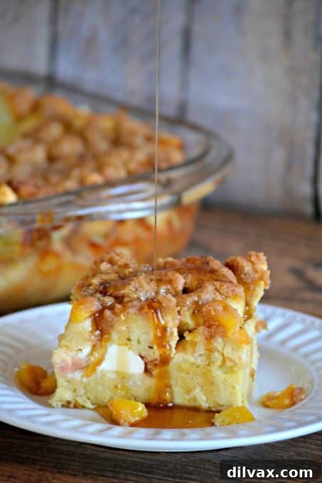 Seasonal Peaches and Cream Baked French Toast, a delightful breakfast combining fresh peaches, cream cheese, French bread, and a sweet egg mixture.