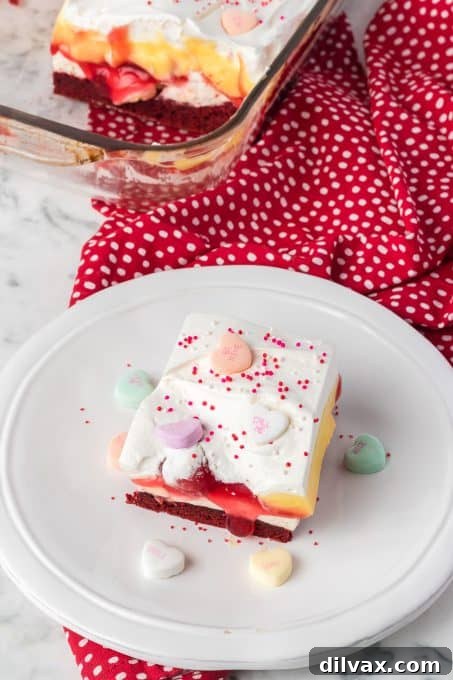 Top view of Red Velvet Lasagna, showing the layers and cherry topping.