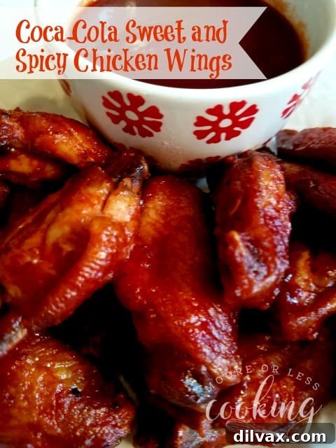 Pinterest-Perfect Game Day Boards 11 Sweet and Spicy Coca-Cola Chicken Wings from Moore or Less Cooking, a sticky and flavorful Game Day appetizer that's always a hit.