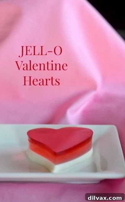 Layered JELL-O Valentine Hearts, a festive and fun gelatin treat for the holidays.