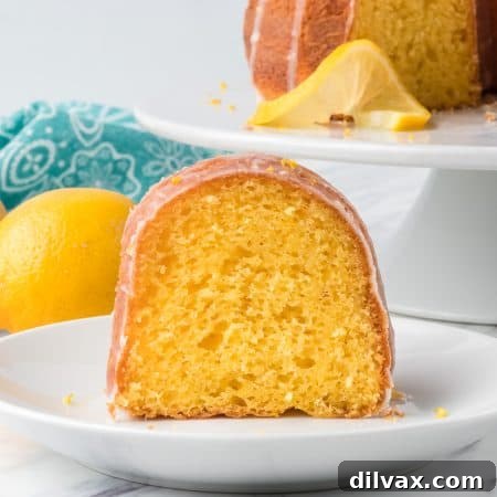 A piece of Easy Lemon Cake with lemons
