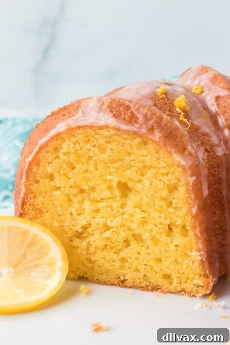 Gigi's Effortless Lemon Cake 3 An overhead shot showcasing the beautiful golden crumb of a moist lemon bundt cake, ready to be sliced and served.
