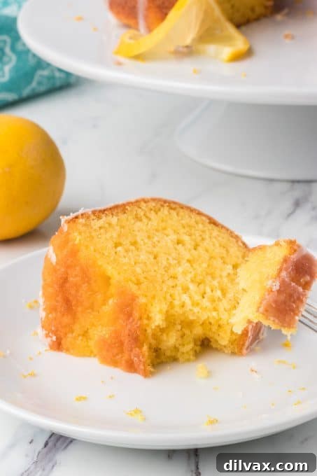 Gigi's Effortless Lemon Cake 10 A beautifully baked and glazed Easy Lemon Cake, cooling on a wire rack, ready to be enjoyed.