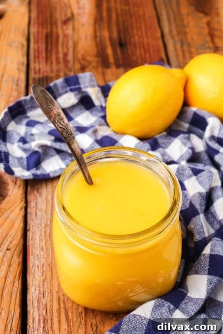 Easy Lemon Curd spooned into a jar