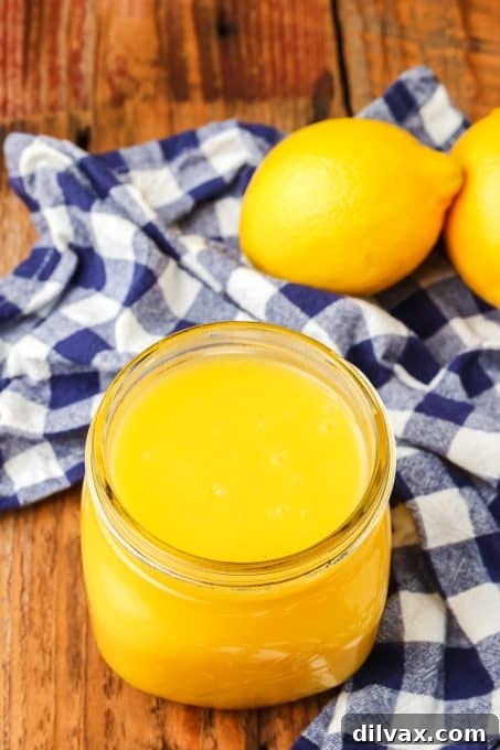 A jar of homemade lemon curd ready to be enjoyed