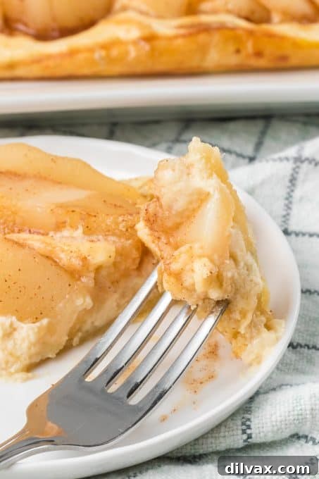 A puff pastry Danish made with pears and a marzipan cream cheese filling.