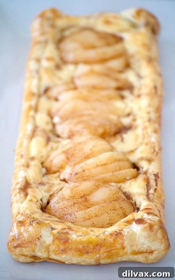 This Pear Cream Cheese Danish, with Marzipan cream cheese filling, sliced Libby's pears and cinnamon honey, will be a recipe you'll want to make repeatedly.