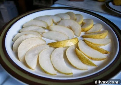 Spiced Pear Delights 4 A beautifully composed shot of cinnamon pear slices, ready to be pinned.