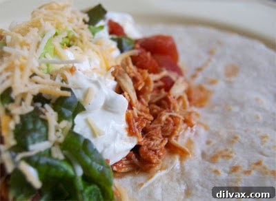 Slow Cooker Zesty Taco Chicken 2 Delicious Crockpot Taco Chicken served in a bowl