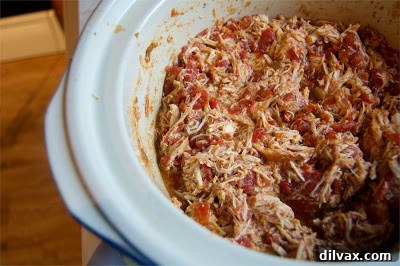Slow Cooker Zesty Taco Chicken 6 Shredded chicken returned to slow cooker sauce