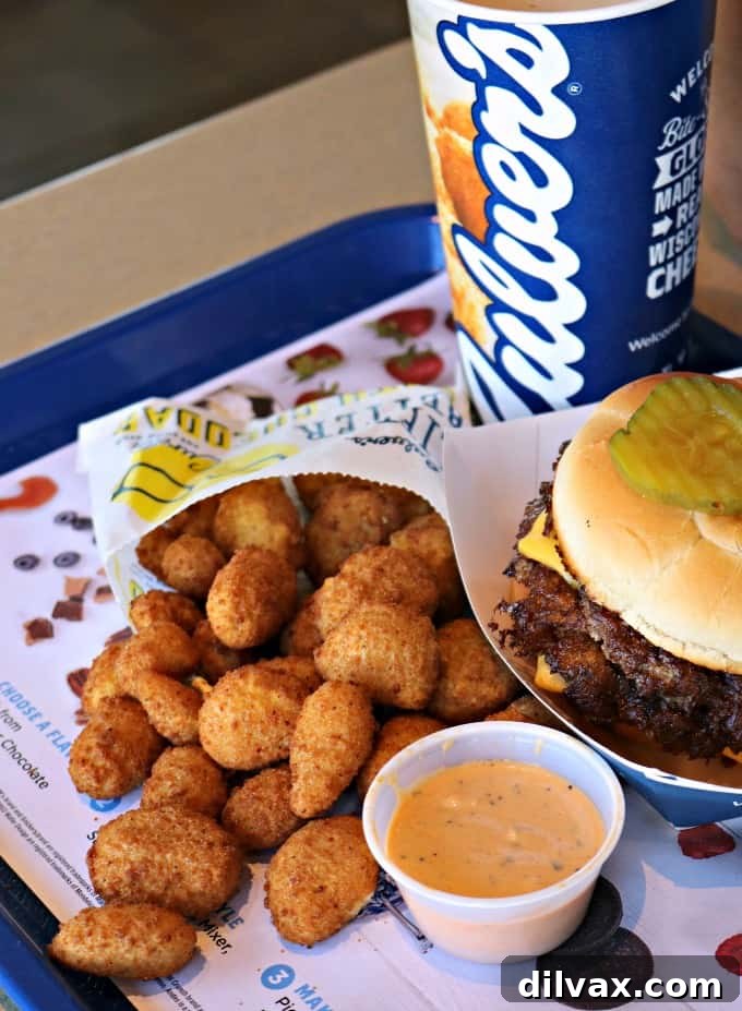 Celebrate National Cheese Curd Day, the Culvers Way 4 Close-up of golden-fried Culver's cheese curds, perfect for National Cheese Curd Day