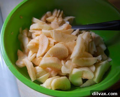 Homemade blueberry applesauce in a glass jar, ready for storage.
