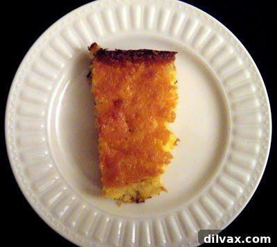 Blueberry Cinnamon Apple Delight 7 A golden brown pan of fluffy Corn Spoon Bread, a comforting side dish.