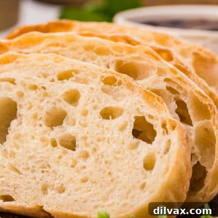 Slices of Ciabatta on a cutting board.